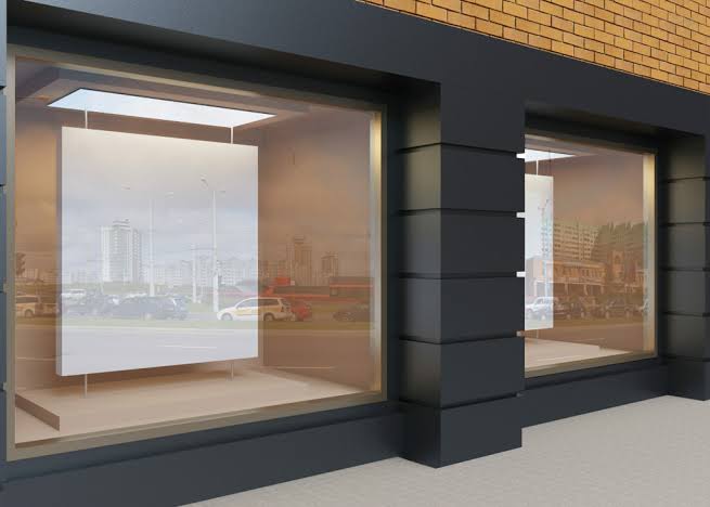 More Than Empty Glass: How Businesses Use Storefront Windows for Branding, Information, and Promotions
